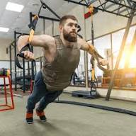 Flexora Suspension Trainer (TRX) hanging from a sturdy door anchor, showing adjustable straps and handles for functional fitness.